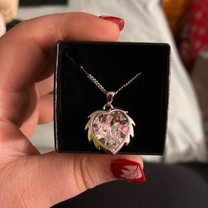 Lion main white heart shaped necklace